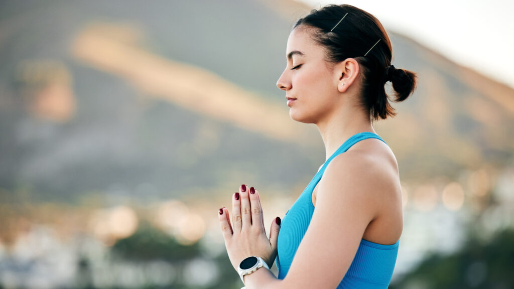 Man and woman meditating on chairs. Text explains that incorporating mind-body techniques into healthcare enhances overall well-being