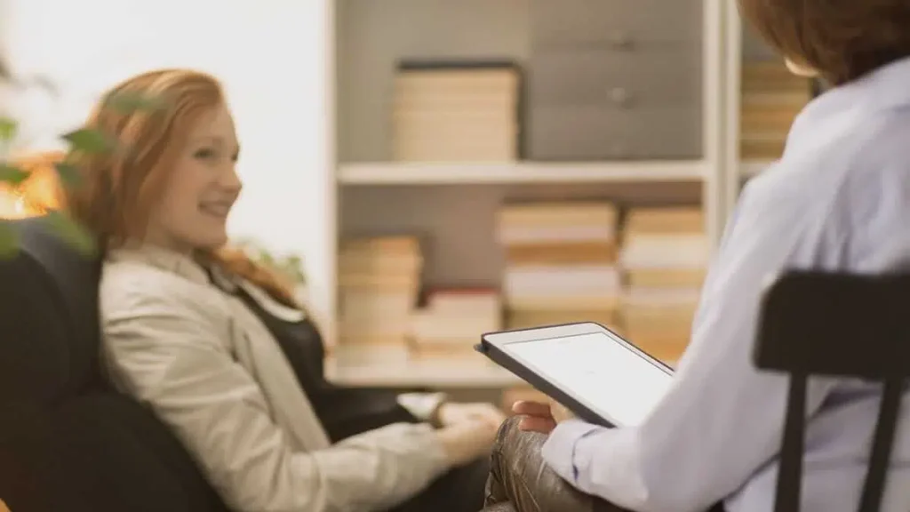 Mental health counselor with clipboard. Collaboration between psychiatrists and therapists creates a comprehensive approach to care.